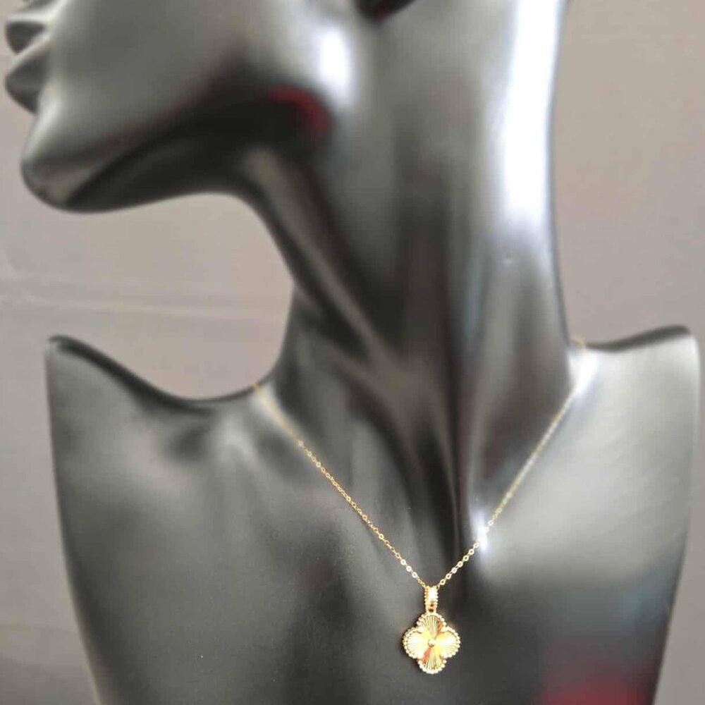 Gold clover design pendant